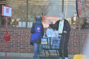 Aurora Lions help Salvation Army bell ringing