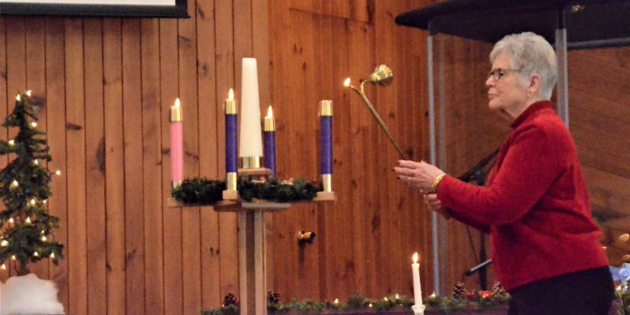 Lighting last Advent candle